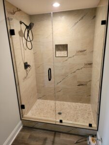 glass shower doors with black accents
