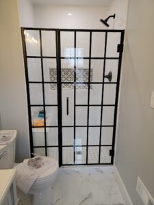 glass shower door with paneling