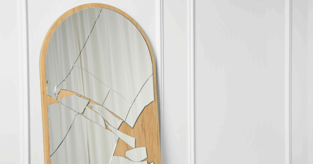 Broken standing mirror