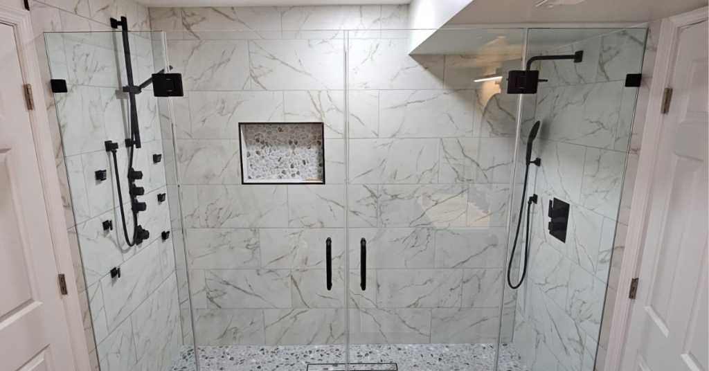 A frameless glass shower installed by The Glass Guys.